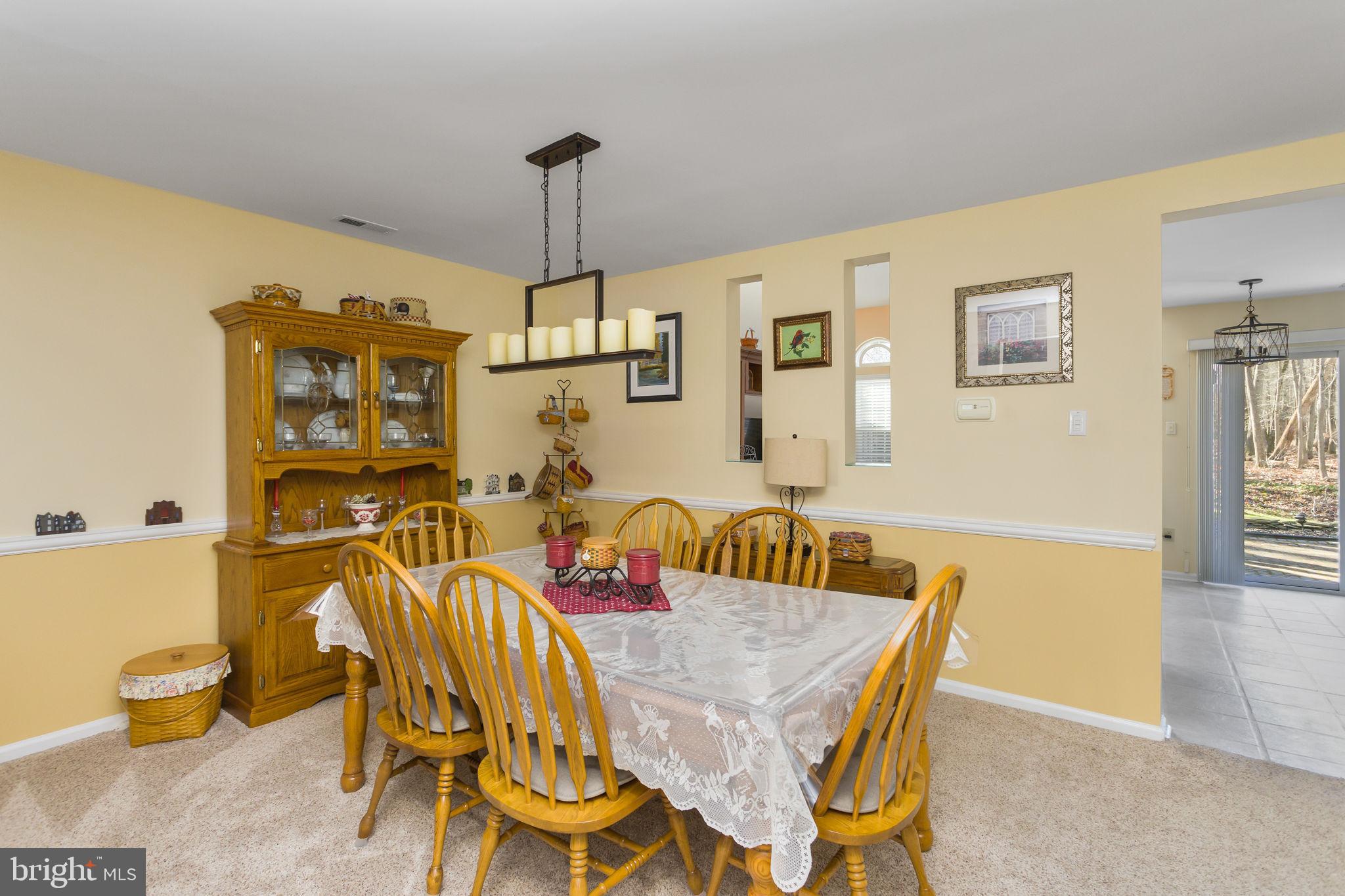 8 Kettlebrook Drive Mount Laurel, NJ 08054 - Photo 9 of 37 a view of a dining room with furniture