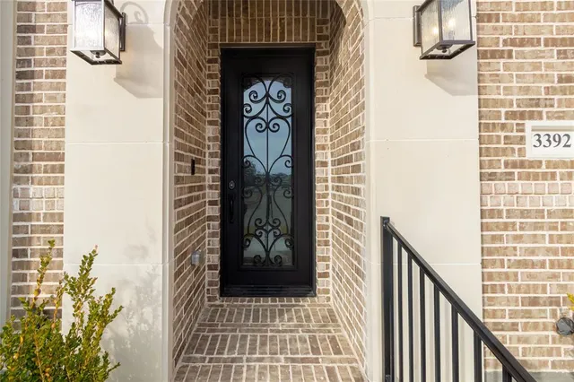 a view of a door and a street view