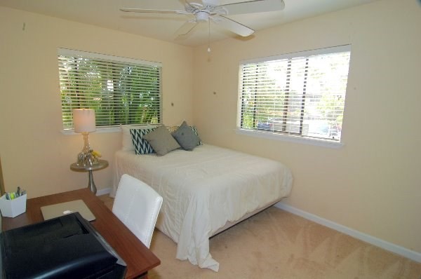 75-123 Lunapule Road, Unit 201 Kailua-Kona, HI 96740 - Photo 6 of 8 a bedroom with a bed and a window