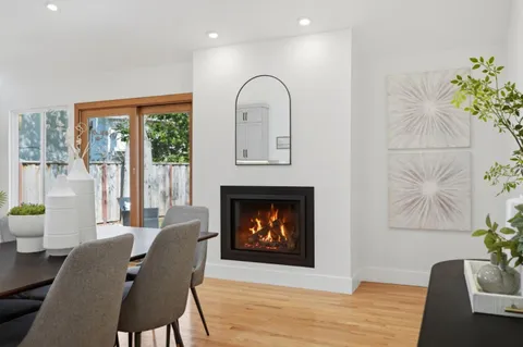 a kitchen with a stove sink and microwave