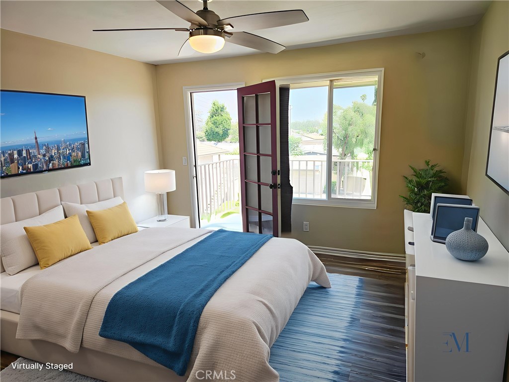 874 Cinnamon Lane Duarte, CA 91010 - Photo 17 of 32 a bedroom with a bed and wooden floor