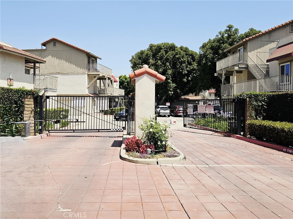 874 Cinnamon Lane Duarte, CA 91010 - Photo 26 of 32 a front view of a house with a garden
