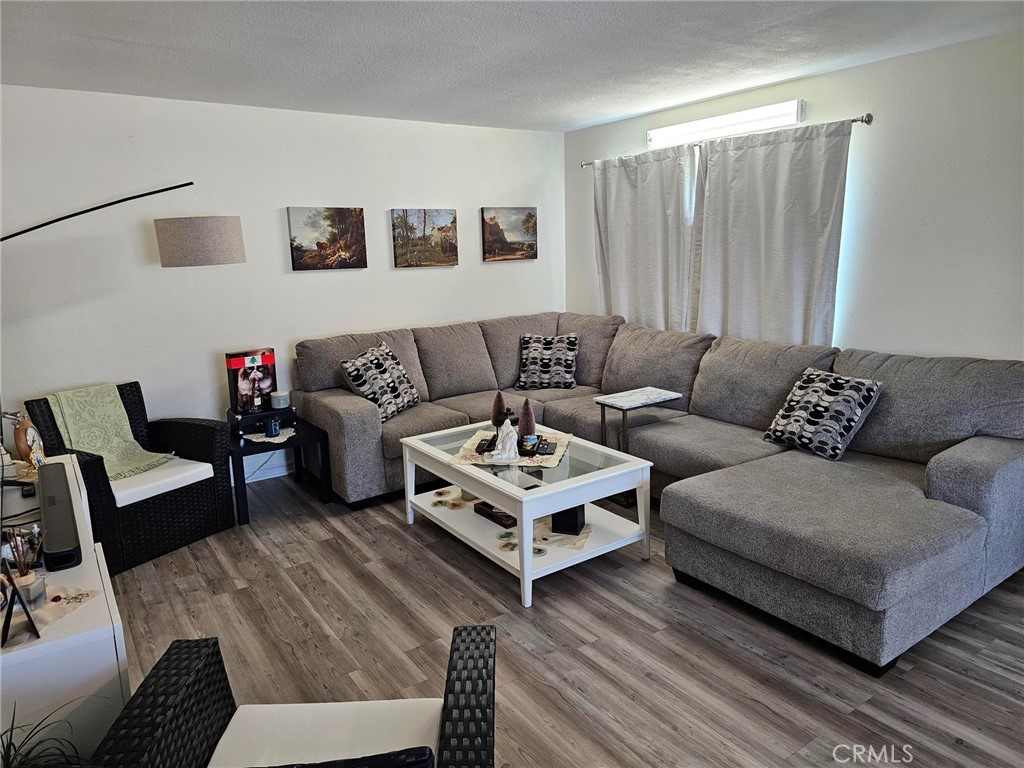 874 Cinnamon Lane Duarte, CA 91010 - Photo 4 of 32 a living room with furniture and a couch
