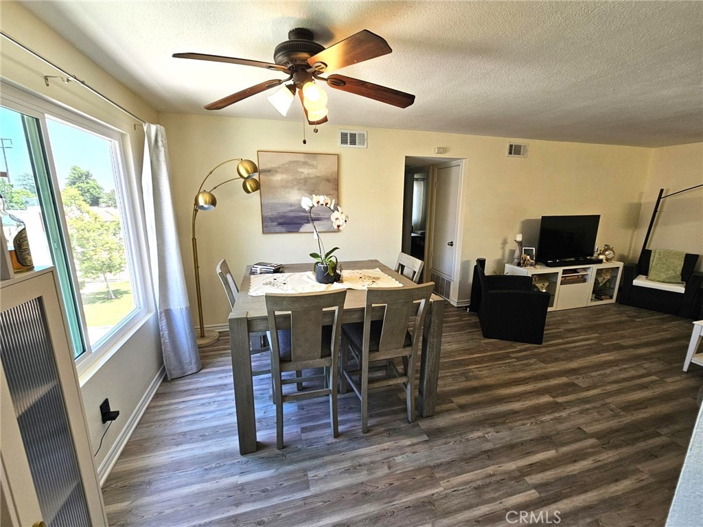 874 Cinnamon Lane Duarte, CA 91010 - Photo 5 of 32 a view of a dining room with furniture window and wooden floor