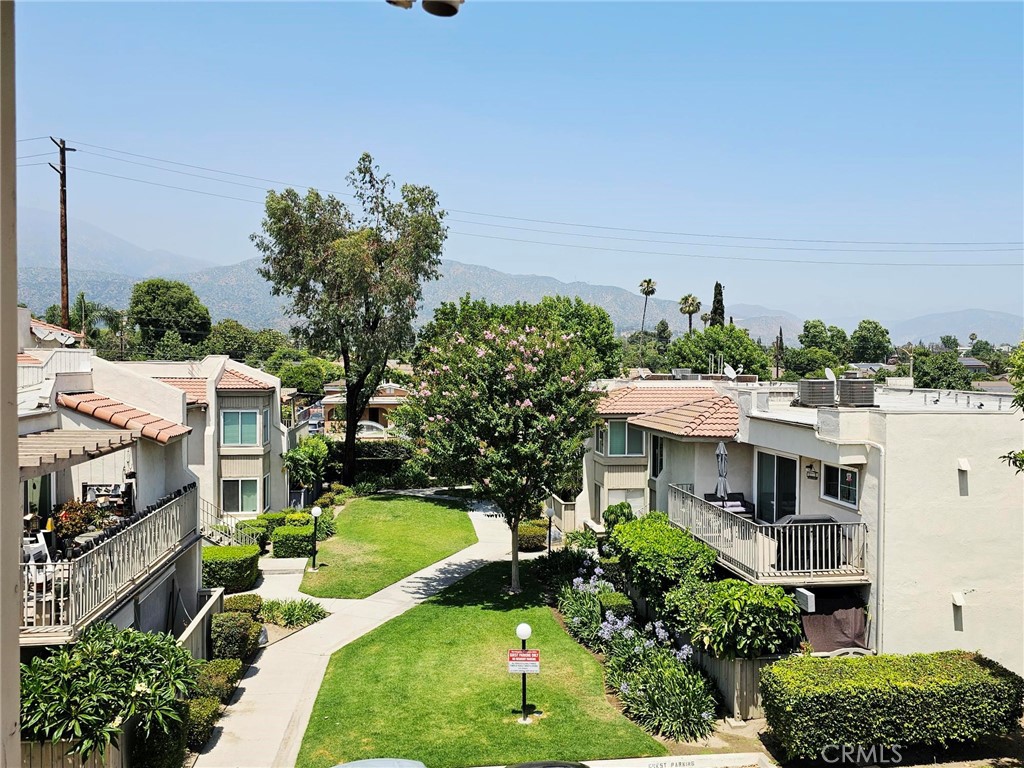 874 Cinnamon Lane Duarte, CA 91010 - Photo 7 of 32 a front view of a house with a yard