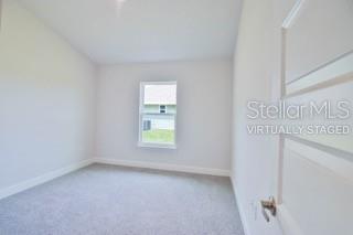 1827 Roberts Trail Bell, FL 32619 - Photo 28 of 28 a view of an empty room with a window