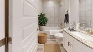 1827 Roberts Trail Bell, FL 32619 - Photo 4 of 28 a bathroom with a granite countertop bathtub sink and toilet