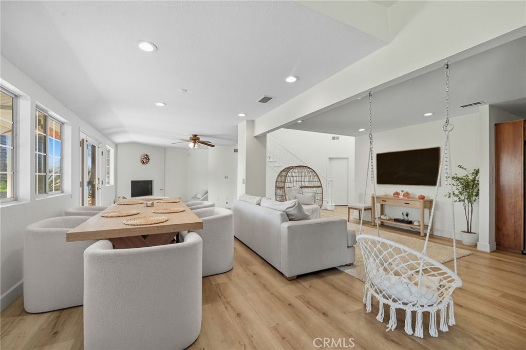 15901 Viewpoint Road Riverside, CA 92504 - Photo 11 of 46 a living room with fireplace furniture and a flat screen tv