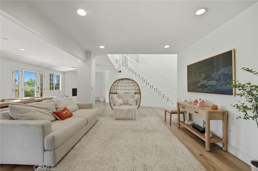 15901 Viewpoint Road Riverside, CA 92504 - Photo 12 of 46 a living room with furniture and a flat screen tv