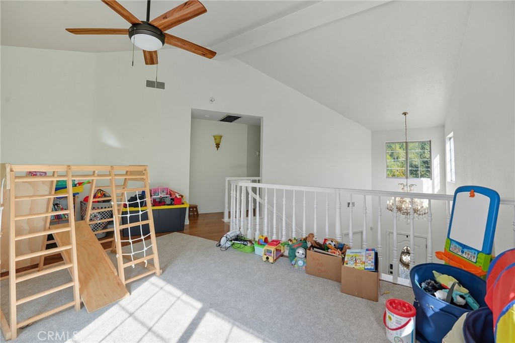 15901 Viewpoint Road Riverside, CA 92504 - Photo 20 of 46 a view of a livingroom with furniture and toys