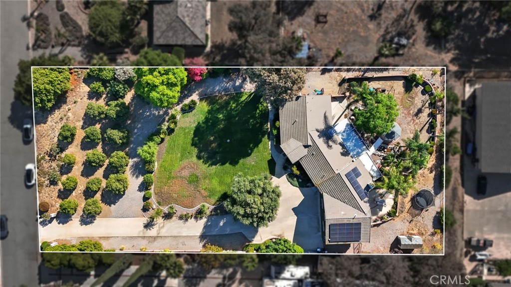 15901 Viewpoint Road Riverside, CA 92504 - Photo 2 of 46 an aerial view of house with a yard and garden