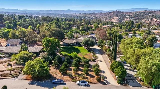 an aerial view of residential house with outdoor space