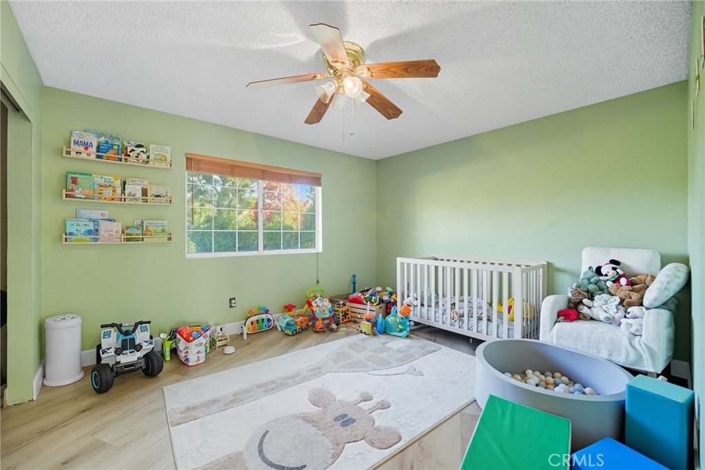 15901 Viewpoint Road Riverside, CA 92504 - Photo 34 of 46 a bedroom with furniture and a window