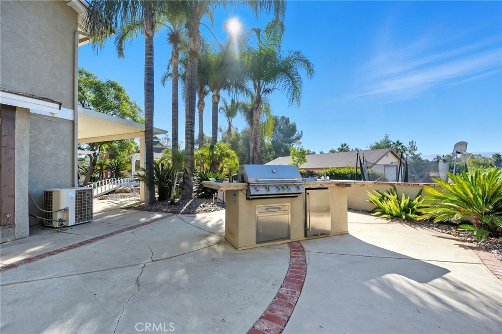 15901 Viewpoint Road Riverside, CA 92504 - Photo 41 of 46 a house view with a sitting space and garden view