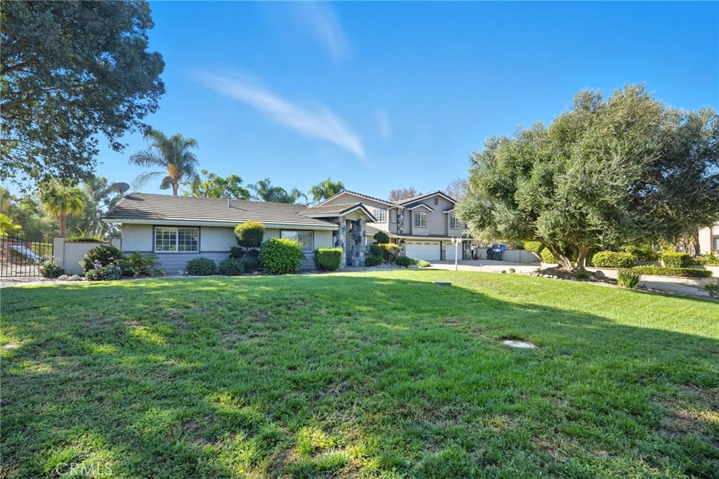 15901 Viewpoint Road Riverside, CA 92504 - Photo 8 of 46 a front view of house with yard and green space
