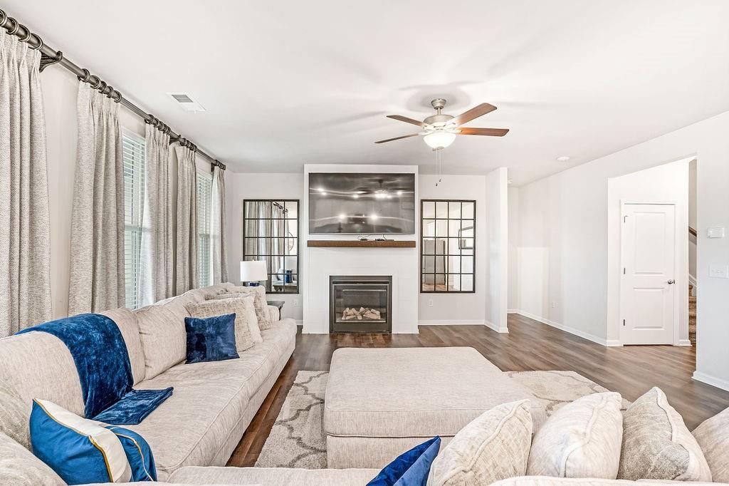 112 Leveret Road Locust Grove, GA 30248 - Photo 13 of 47 a bedroom with furniture fireplace and a window