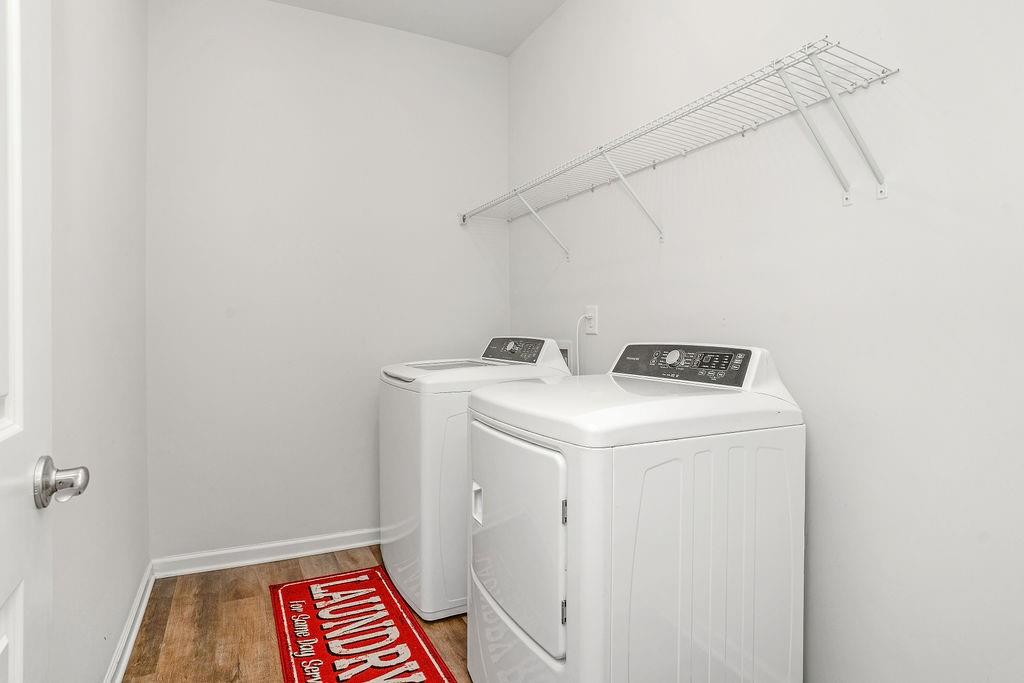 112 Leveret Road Locust Grove, GA 30248 - Photo 40 of 47 a utility room with dryer and washer