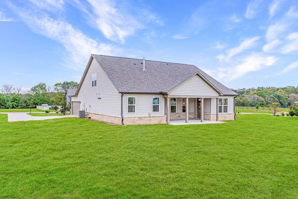 112 Leveret Road Locust Grove, GA 30248 - Photo 44 of 47 a front view of a house with a yard