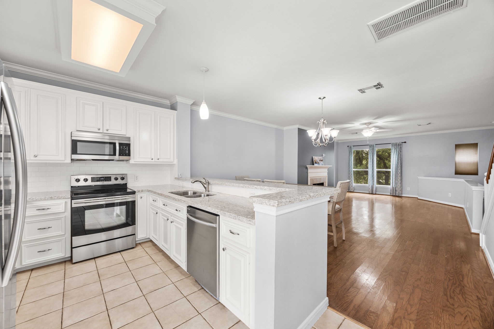 3023 Austin Street Houston, TX 77004 - Photo 15 of 26 Kitchen overlooks dining and living area