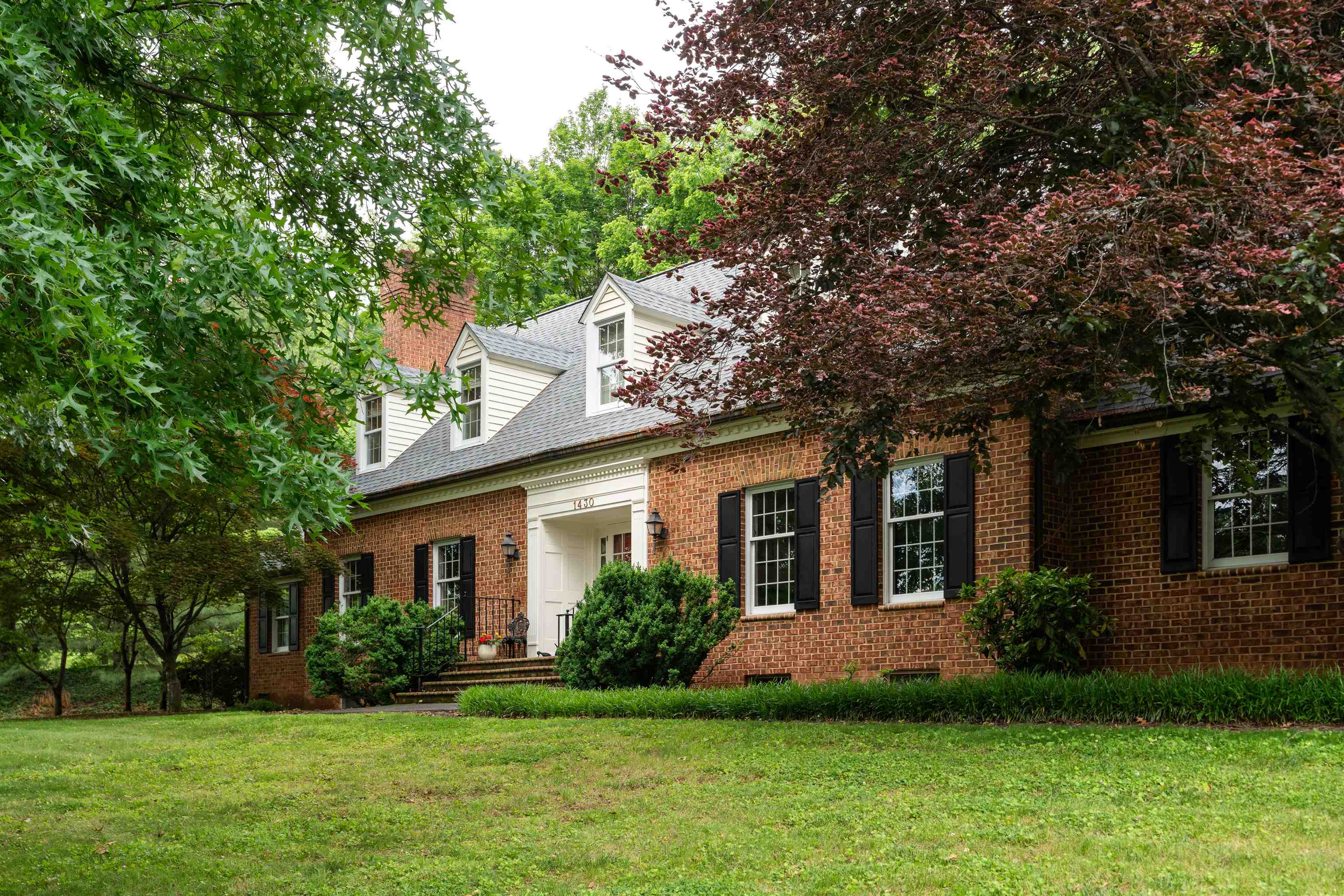 1430 Dogwood Road Staunton, VA 24401 - Photo 63 of 68 a front view of a house with a yard and garage