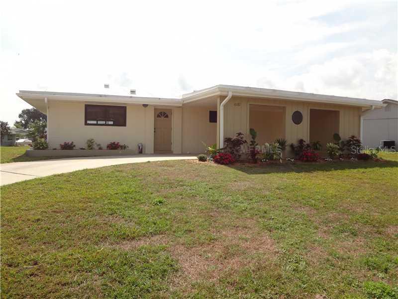 Exterior Front - Meticulously  updated, Metal Roof, New Landscaping, Double Paned windows,  Entire House guttered.