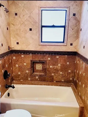 a bathroom with a bathtub