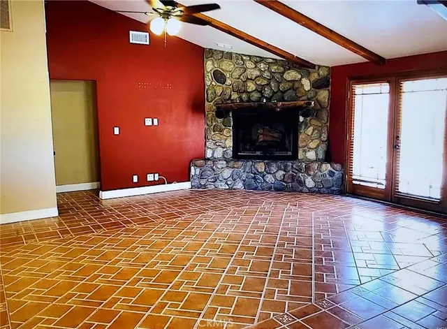a view of a livingroom with furniture and front door
