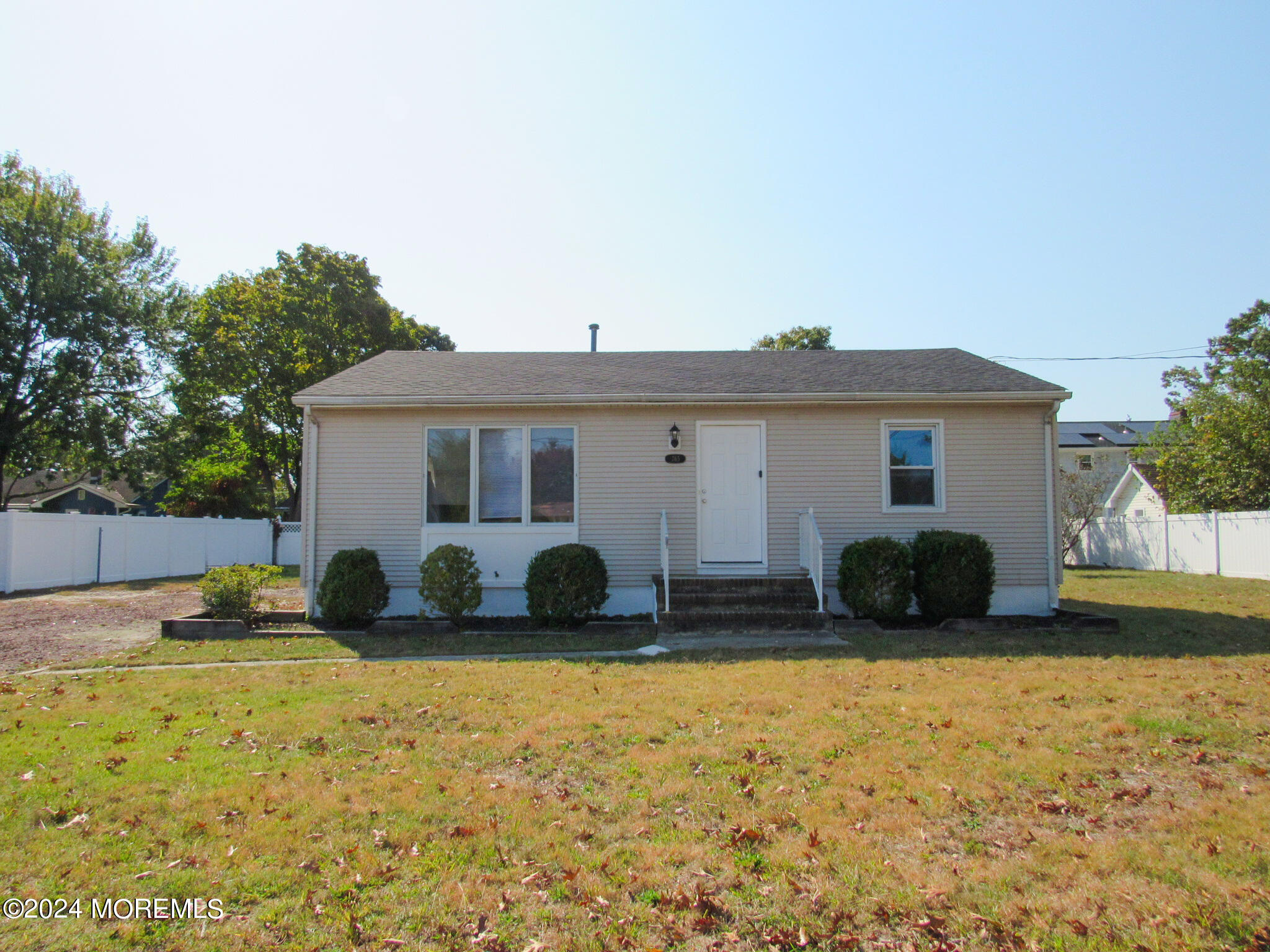 a house view with a garden space