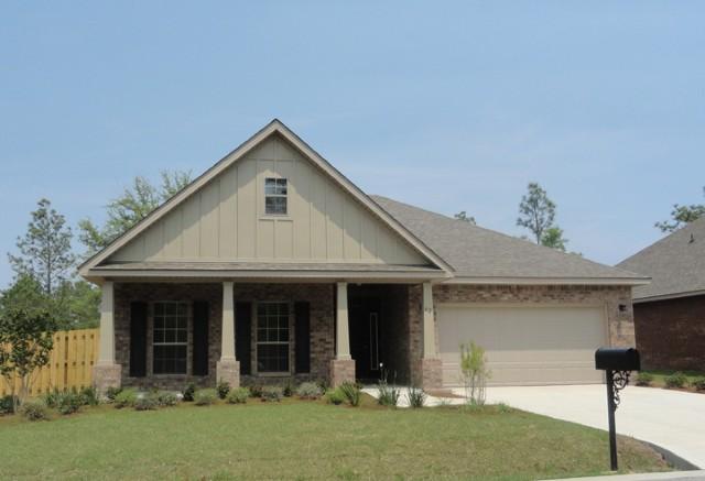 Lot 14 Maddox Street Santa Rosa Beach, FL 32459 - Photo 1 of 1 a front view of a house with garden