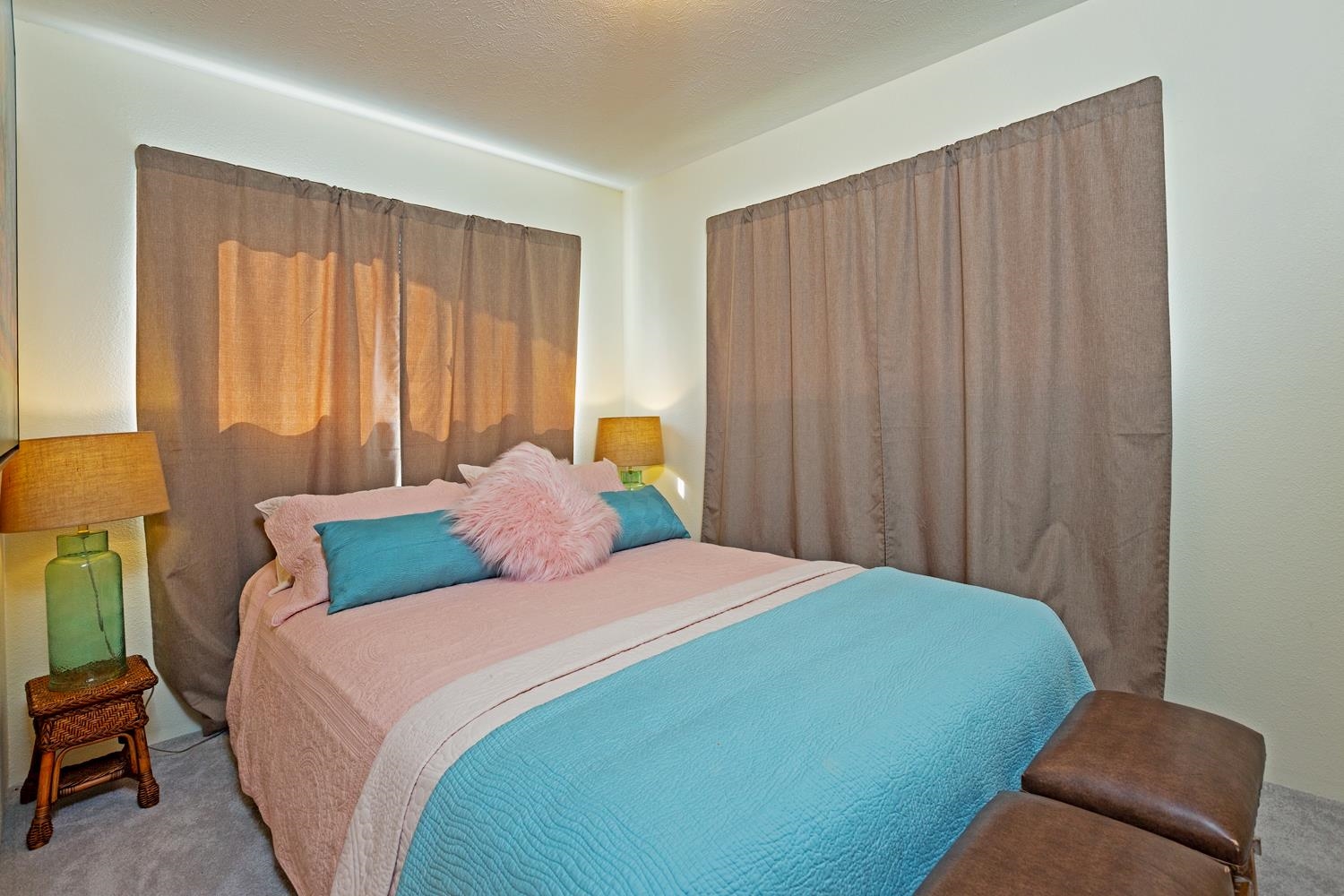 974 Haiku Road Haiku, HI 96708 - Photo 14 of 27 a bedroom with a bed and a chair