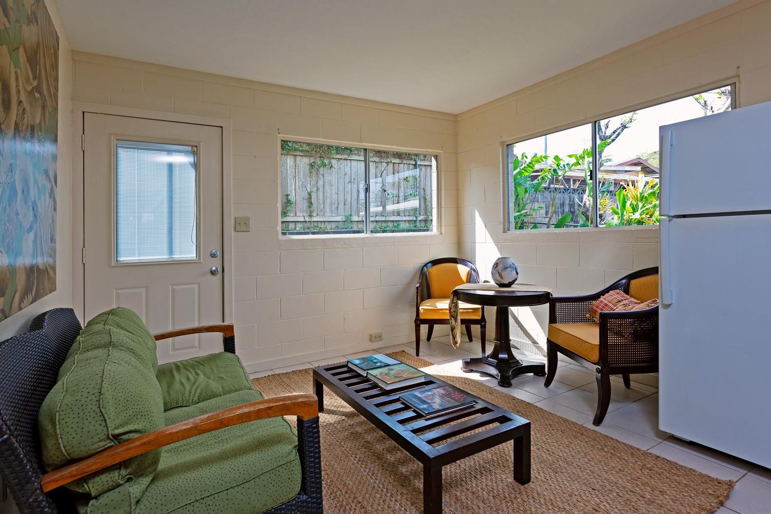974 Haiku Road Haiku, HI 96708 - Photo 17 of 27 a living room with furniture and a window