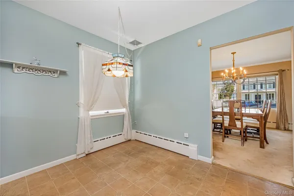 a view of a livingroom with furniture window and outside view