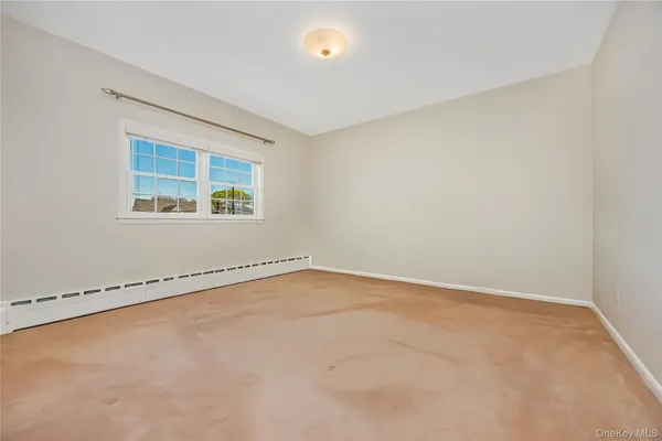 an empty room with a workbench