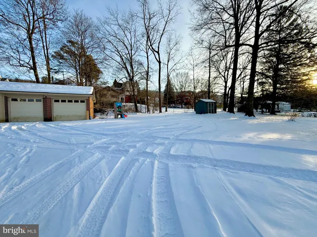 a view of a house with a snow
