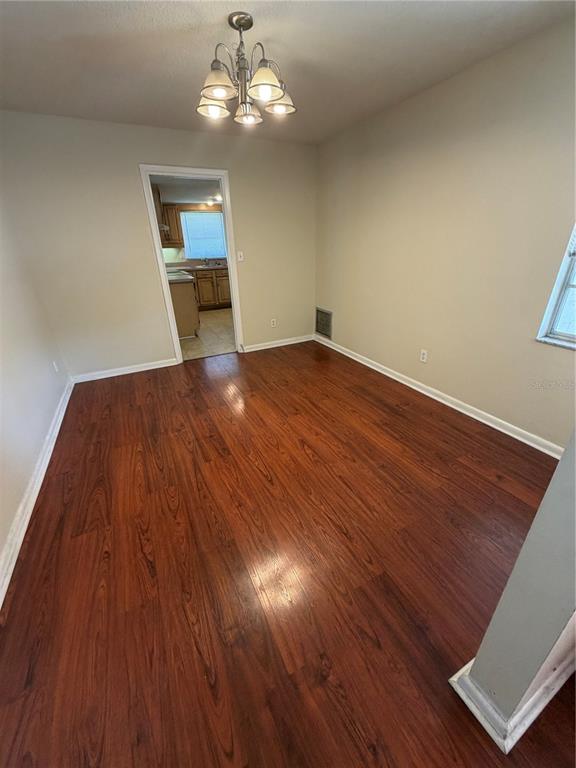 517 London Road Winter Park, FL 32792 - Photo 6 of 13 a view of empty room with wooden floor