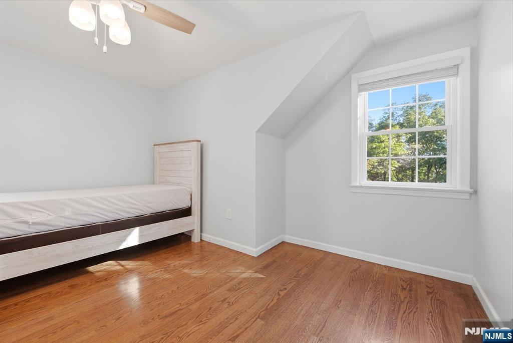 44 Alpine Place Kearny, NJ 07032 - Photo 37 of 50 a view of room with window and wooden floor