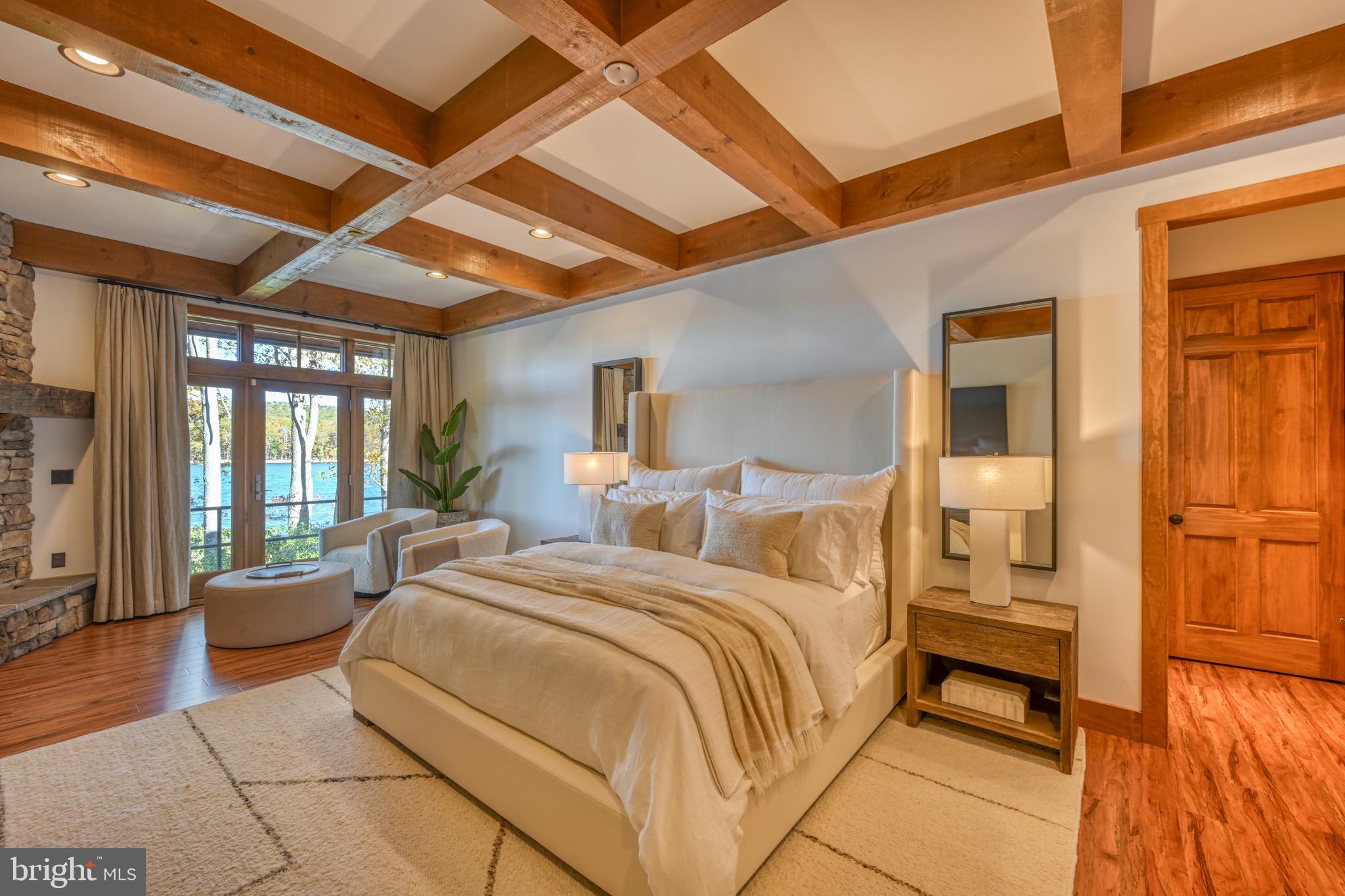 3135 Turkey Neck Road Swanton, MD 21561 - Photo 25 of 74 a bed room with a bed and a large window