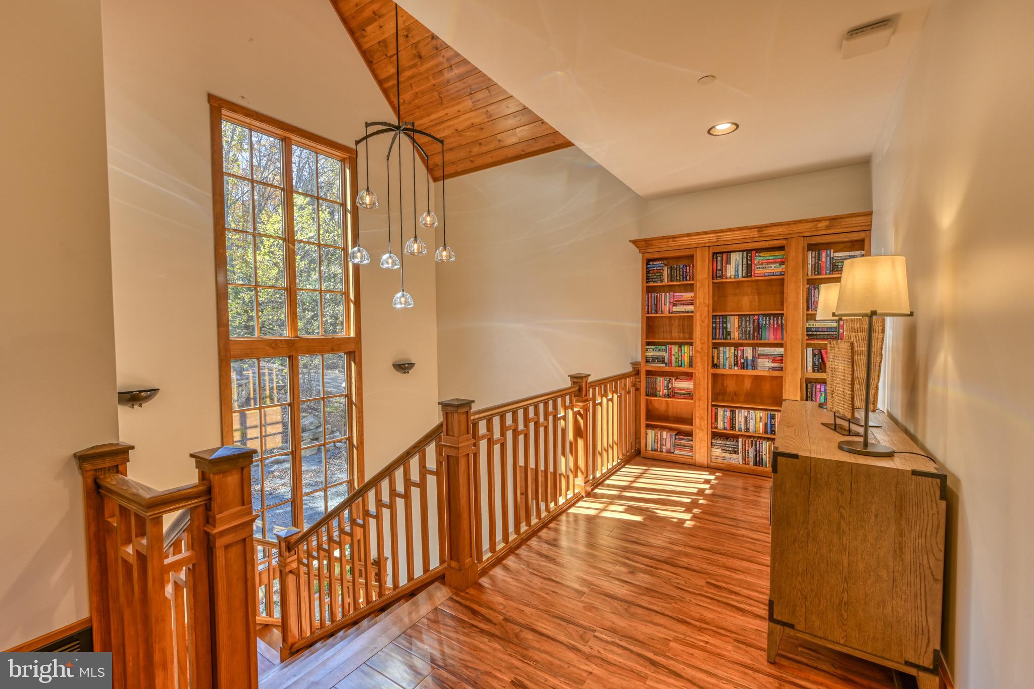 3135 Turkey Neck Road Swanton, MD 21561 - Photo 30 of 74 a view of a room with wooden floor and windows