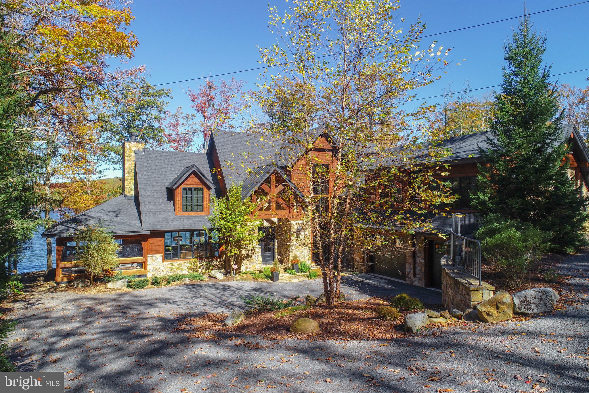 3135 Turkey Neck Road Swanton, MD 21561 - Photo 3 of 74 a front view of a house with a yard