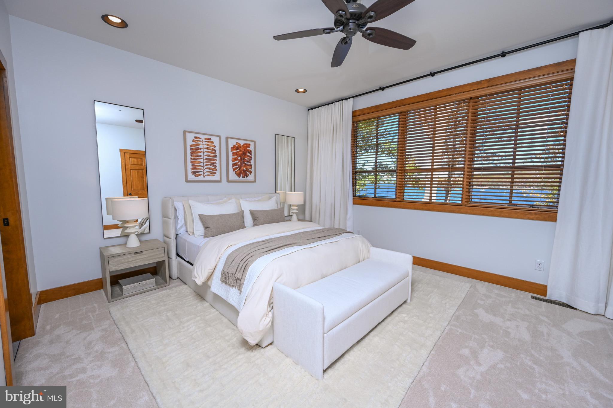 3135 Turkey Neck Road Swanton, MD 21561 - Photo 33 of 74 a spacious bedroom with a bed and a window