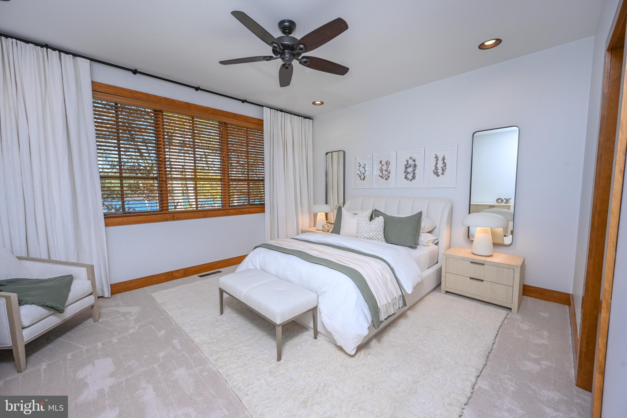 3135 Turkey Neck Road Swanton, MD 21561 - Photo 37 of 74 a spacious bedroom with a bed and a window