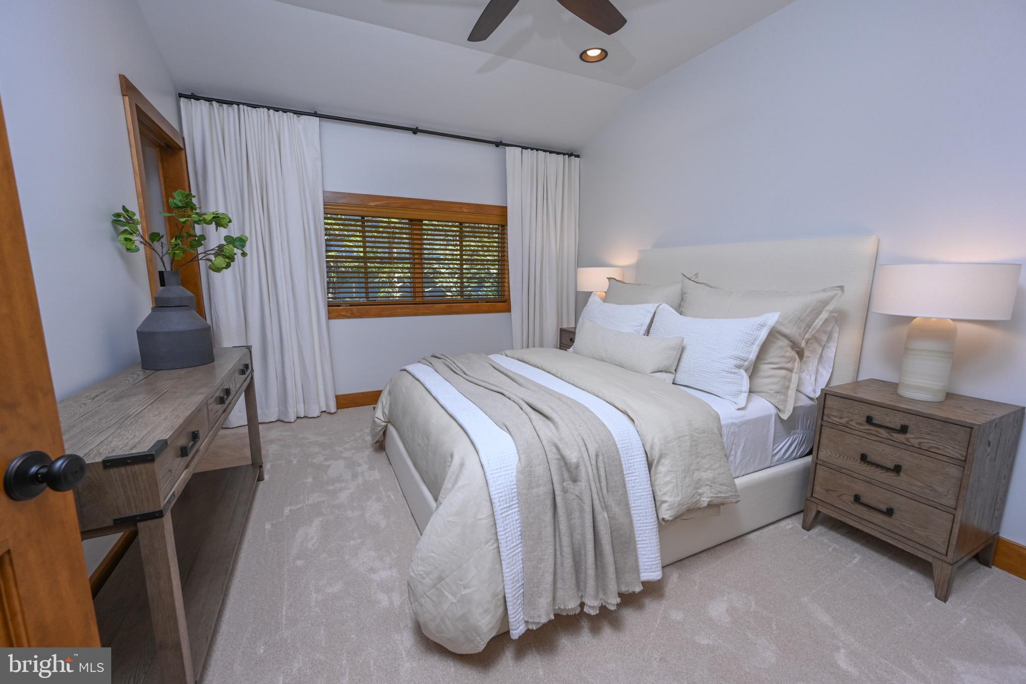 3135 Turkey Neck Road Swanton, MD 21561 - Photo 42 of 74 a bedroom with a bed and a couch