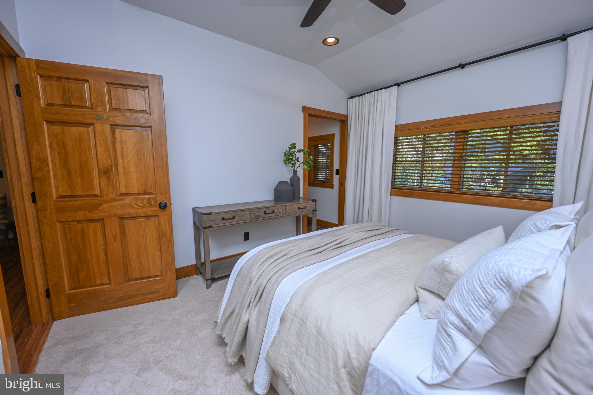 3135 Turkey Neck Road Swanton, MD 21561 - Photo 43 of 74 a bedroom with a bed and a dresser