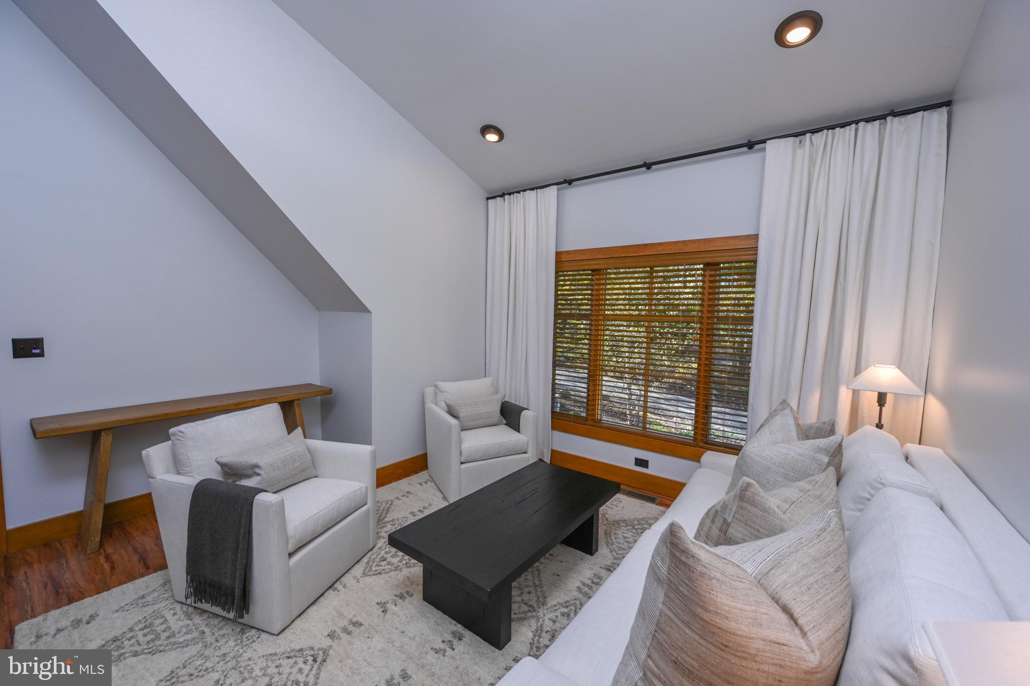 3135 Turkey Neck Road Swanton, MD 21561 - Photo 52 of 74 a living room with furniture and a large window