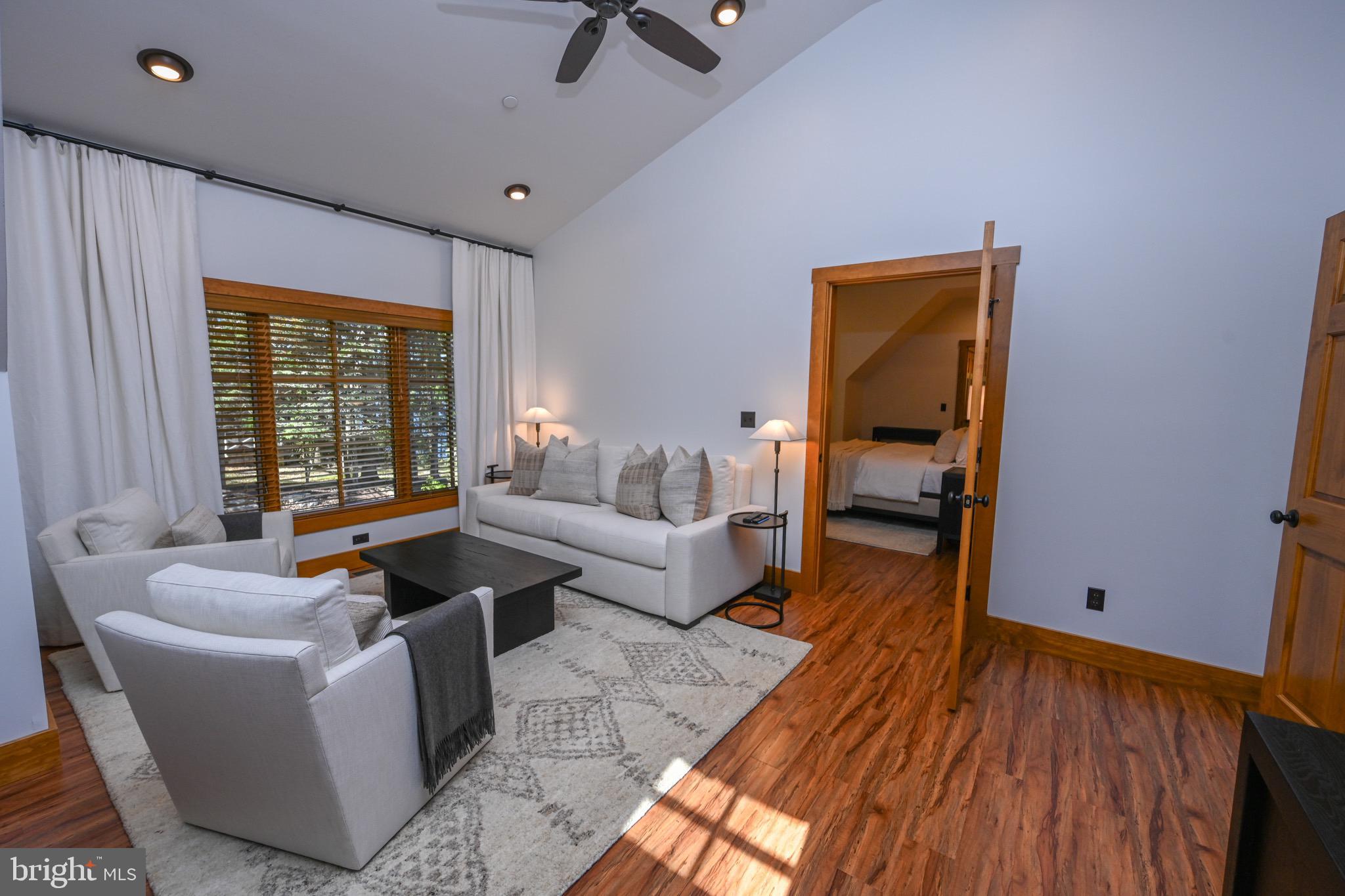 3135 Turkey Neck Road Swanton, MD 21561 - Photo 53 of 74 a living room with furniture and a window