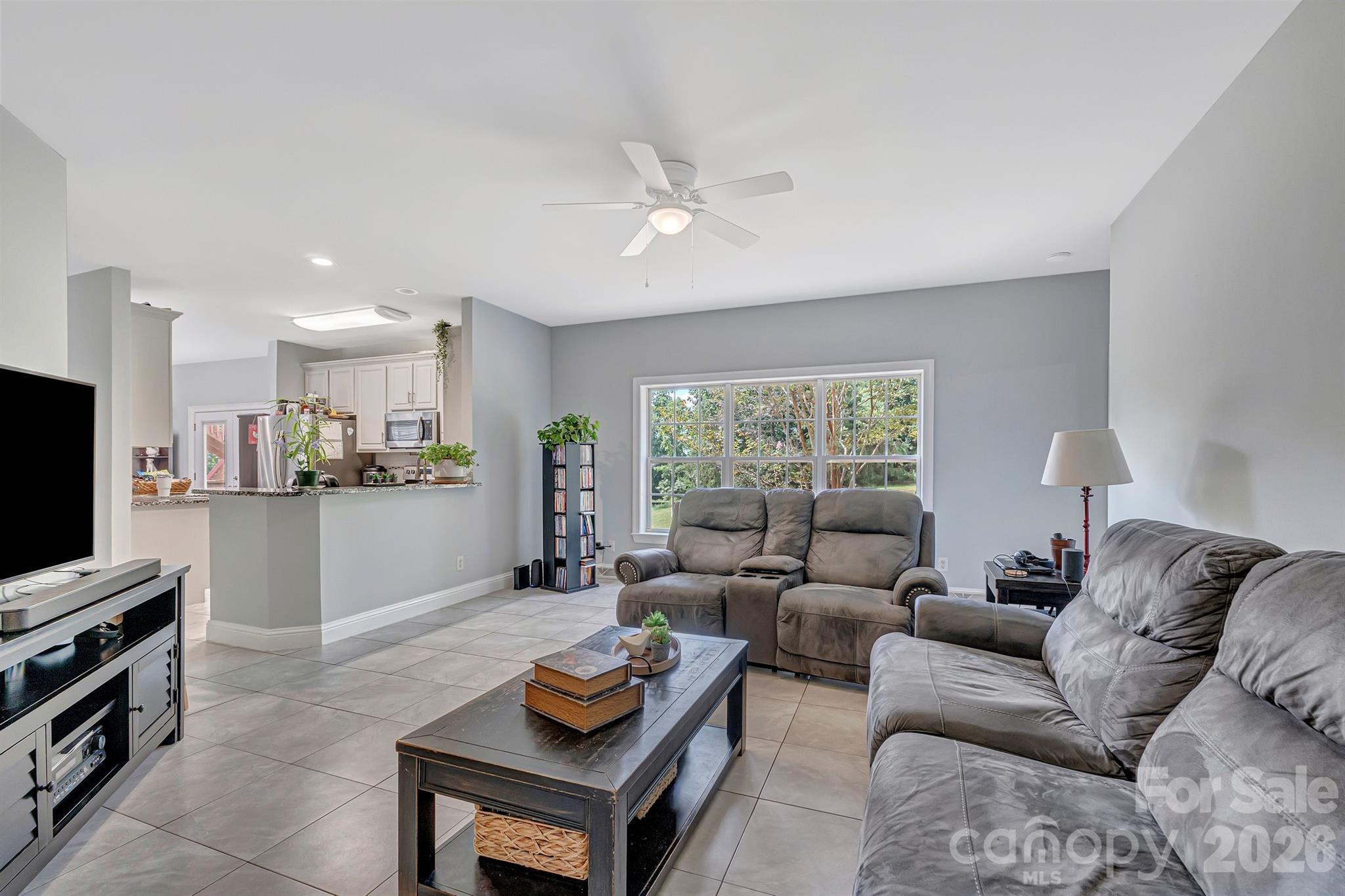 2538 Southside Road Lincolnton, NC 28092 - Photo 12 of 33 a living room with furniture and a flat screen tv