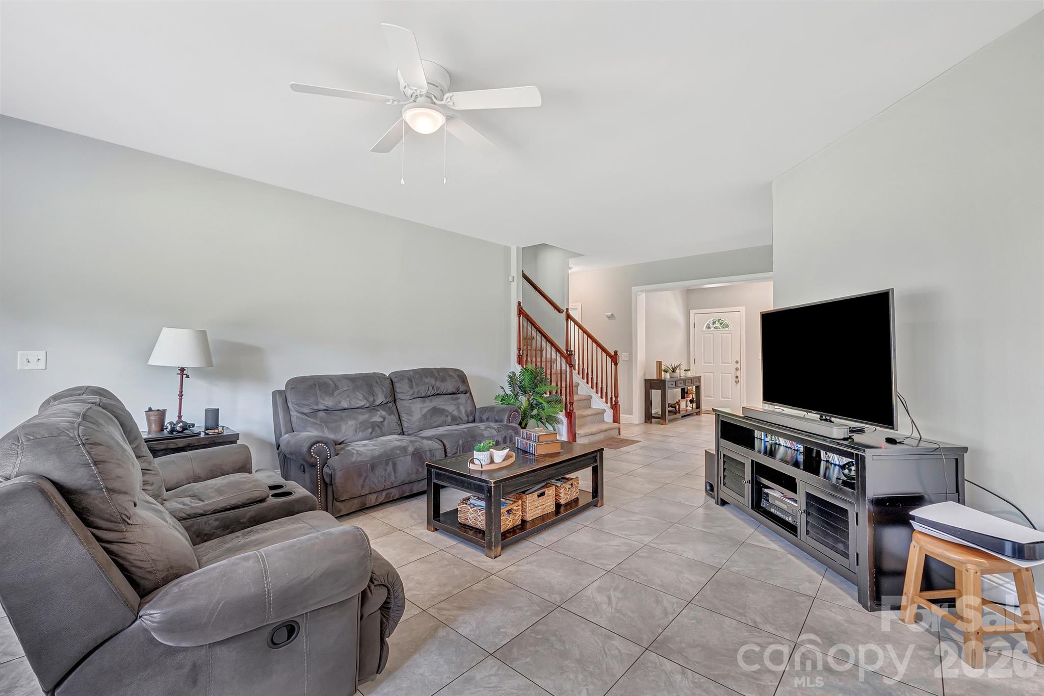2538 Southside Road Lincolnton, NC 28092 - Photo 13 of 33 a living room with furniture and a flat screen tv