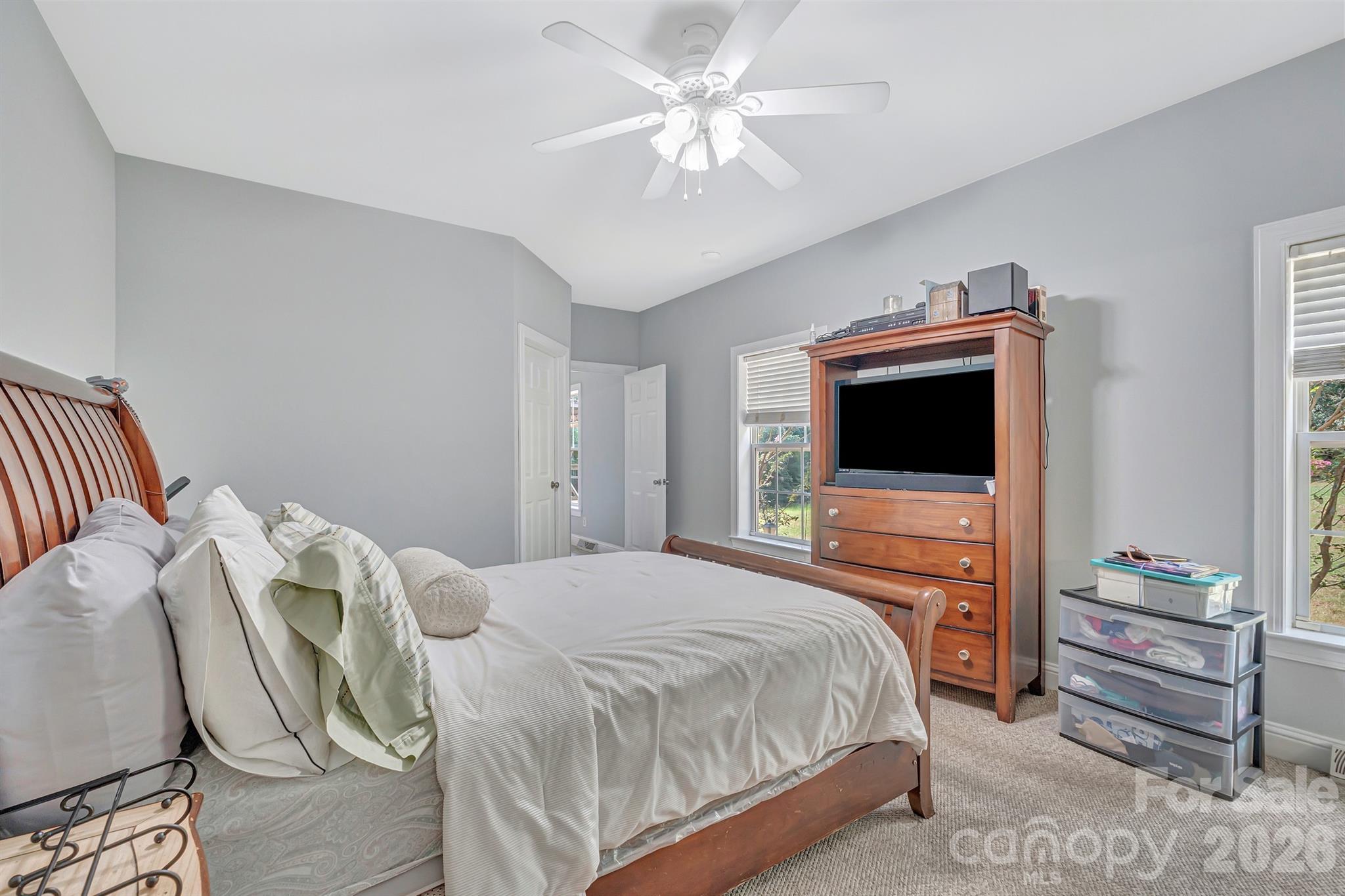 2538 Southside Road Lincolnton, NC 28092 - Photo 16 of 33 a bedroom with a bed and a flat screen tv