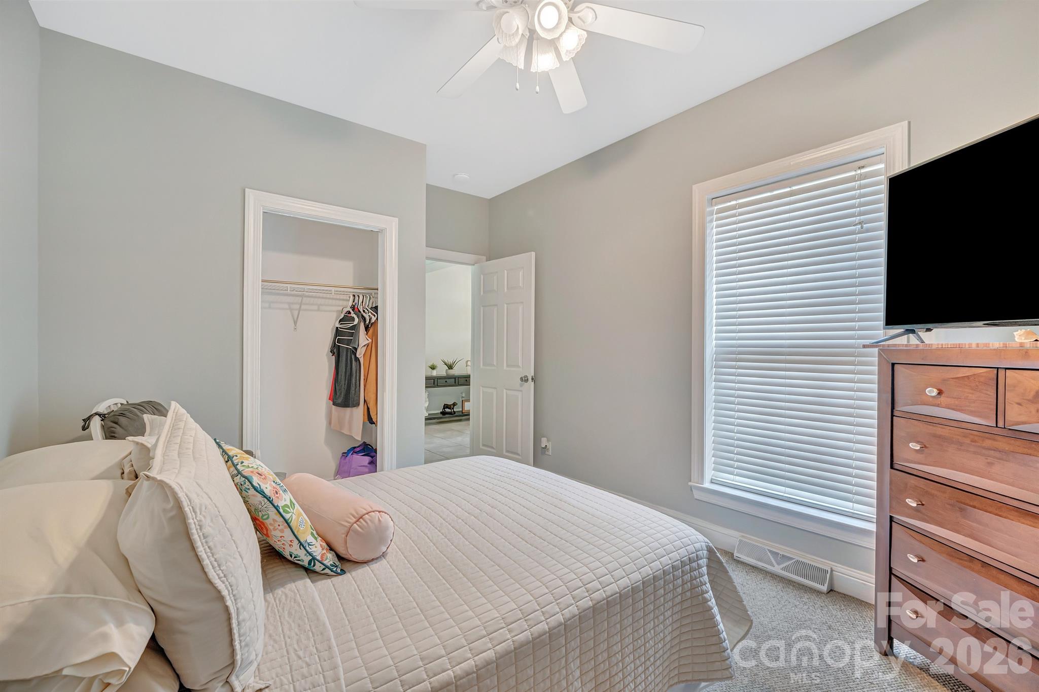 2538 Southside Road Lincolnton, NC 28092 - Photo 20 of 33 a bedroom with a bed and a flat screen tv
