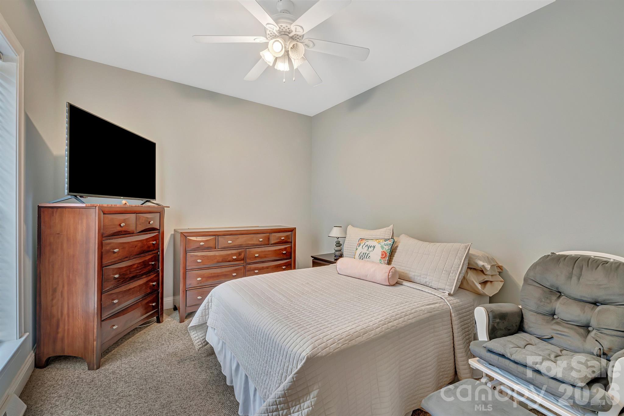 2538 Southside Road Lincolnton, NC 28092 - Photo 21 of 33 a bedroom with a bed and a flat screen tv